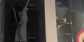 Asian woman spied in public toilet