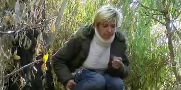 Mature pissing and smoking outdoors