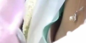 Downblouse shots of asian babes at a picnic