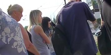 Public upskirt on a bus stop