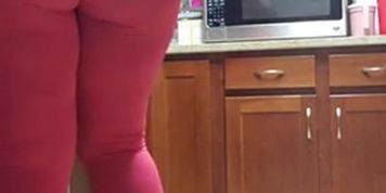 girl cleans stuff with huge ass showing