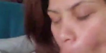 Big booty Latina sucking cock