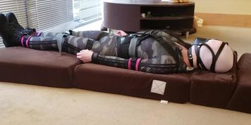 CD in Camouflage Catsuit Struggling in Self-Bondage