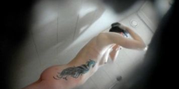 Hot Adrianna spied showering in our bathroom
