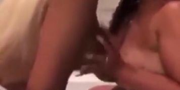 Two freaks playing with big tits