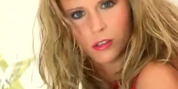 Blonde milf does a christmas strip tease in lingerie and boots (Zuzana Drabinova)