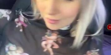 Blonde girl camping un the car