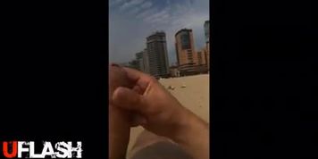 Cumming behind a girl on beach