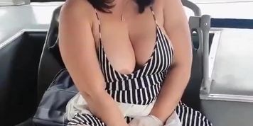 Milf with vibrator on the bus