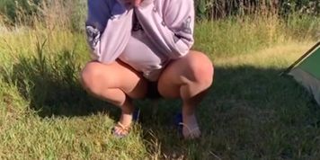 cute baby pissing outside 