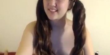 Brunette in front of her webcam
