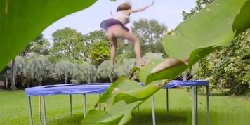 Massive boobs babe bouncing on trampoline