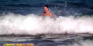 Voyeur comes to nudist beach and films naked girl