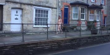 Saggy tit milf walks down a busy public road naked in the uk