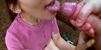Outdoor sex in a public park in the rain.Small girl blows,squirts and takes cum mouth -Squir7een