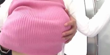 woman in pink sweater