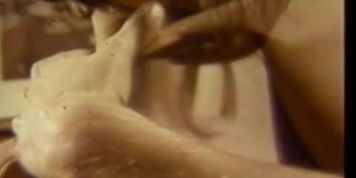 Blonde fingers her hairy pussy in vintage porn scene