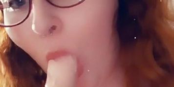 Nerdy redhead sucking dildo. Add me on snapchat iducane20 
