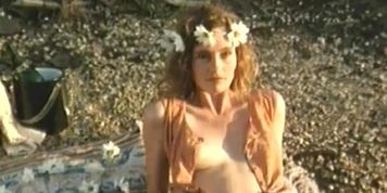 Erika Anderson Breasts Scene  in Zandalee