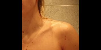 Teen girl discovers spy cam after she plays with her pussy in the shower