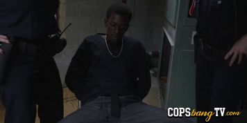 Curvy and naughty female cops are sucking this black criminals huge shlong - video 1