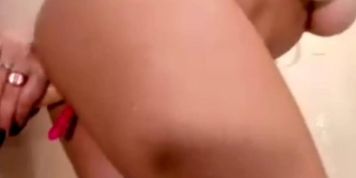Hitting the dildo under shower