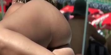 Woman naked in nudist beach