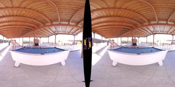 Topless blondes playing pool