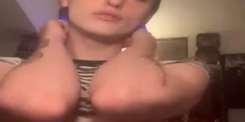 Trans girl plays with small boobs