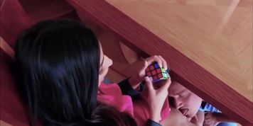 Emily Willis gets her pussy licked and fucked under the table whilst solving a Rubik&rsquo;s cube