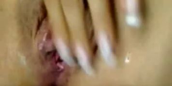 exotic girl playing with her clit in front of the webcam..mp4