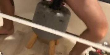 A young hairy submissive boy fucks his huge 9 cm dildo.  Cunt destroyed.