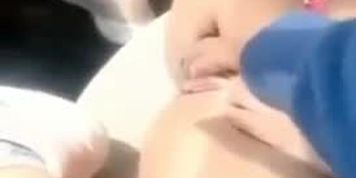 Saudi girl with her bf in the car