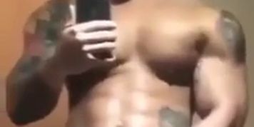 tatted up muscle man pumps a nice load of cum