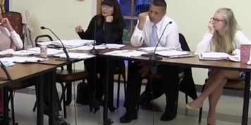 Incredible shoeplay by blonde during meeting