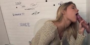 Gorgeous brunette taking advantage of the glory hole