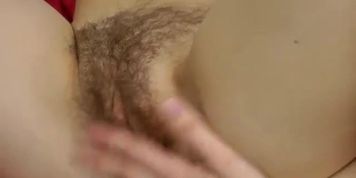 Hairy Stella lets her fingers wander through her jungle