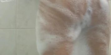 Andrea Kelly is exotic cute brunette girl in the bathroom