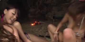 Jap babes screw at the beach