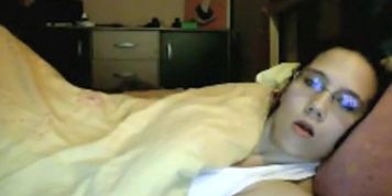 Spying as she rubs it under a blanket