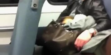 Relaxed girl spreads legs in the train