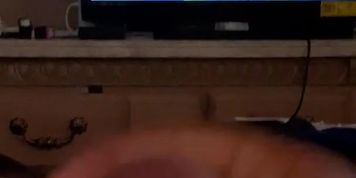Masturbating