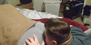 Woman in leggings farting in boy's face