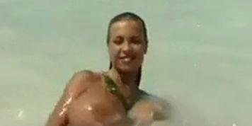 Busty Babe At The Beach