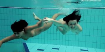 Two sexy teens in the pool