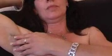 Hairy mature amateur in panties spreads her pussy