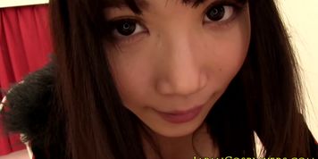 Busty asian uniform babe riding cock after sucking