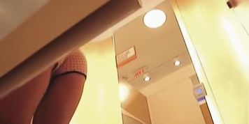 Real teen is voyeured in the changing room undressing