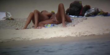 Hot wife flaunts her bushy muff on a nudist beach