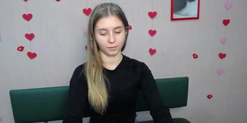 Young Ukrainian blonde in red panties posing on webcam show